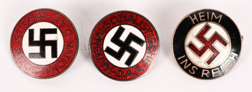 WWII NAZI GERMAN NSDAP PARTY PIN HEIM INS REICH: WWII Nazi German NSDAP Party Pin Lot to include 1) WWII NAZI GERMAN HEIM INS REICH. "HEIM INS REICH" LAPEL PIN. A 24mm diameter, die struck with multi-colored painted work featuring a black outer bord