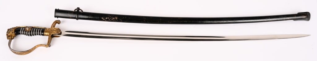 WWII NAZI GERMAN LION HEAD SWORD RED EYES EICKHORN: Nazi German Officers lion head sword with red eyes. Plain blade is in excellent condition. Grip and wire wrap intact. Overall length of the sword is 37" with a 29 3/4" blade. Scabbard retains 80%+ ori