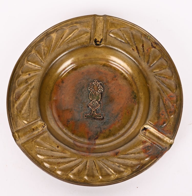 WWII NAZI GERMAN AFRIKAKORPS CIGARETTE ASHTRAY WW2: AfrikaKorps Ashtray measuring 5 7/8 in diameter with a DAK insignia to its center. Excellent. Organization: The Afrika Korps formed on 11 January 1941 and one of Adolf Hitler's favourite generals