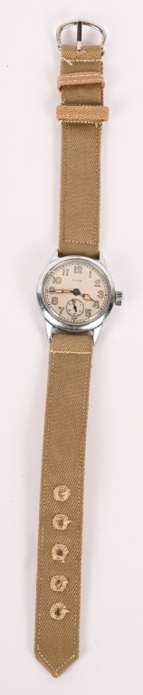 WWII US ARMY ORDNANCE DEPT. ELGIN WRISTWATCH WW2: Ordnance Dept watches were spec'd as the most basic timekeepers for those who need basic timekeeping. This Elgin 15j official military issue watch comes on a real WWII government issue blue strap with