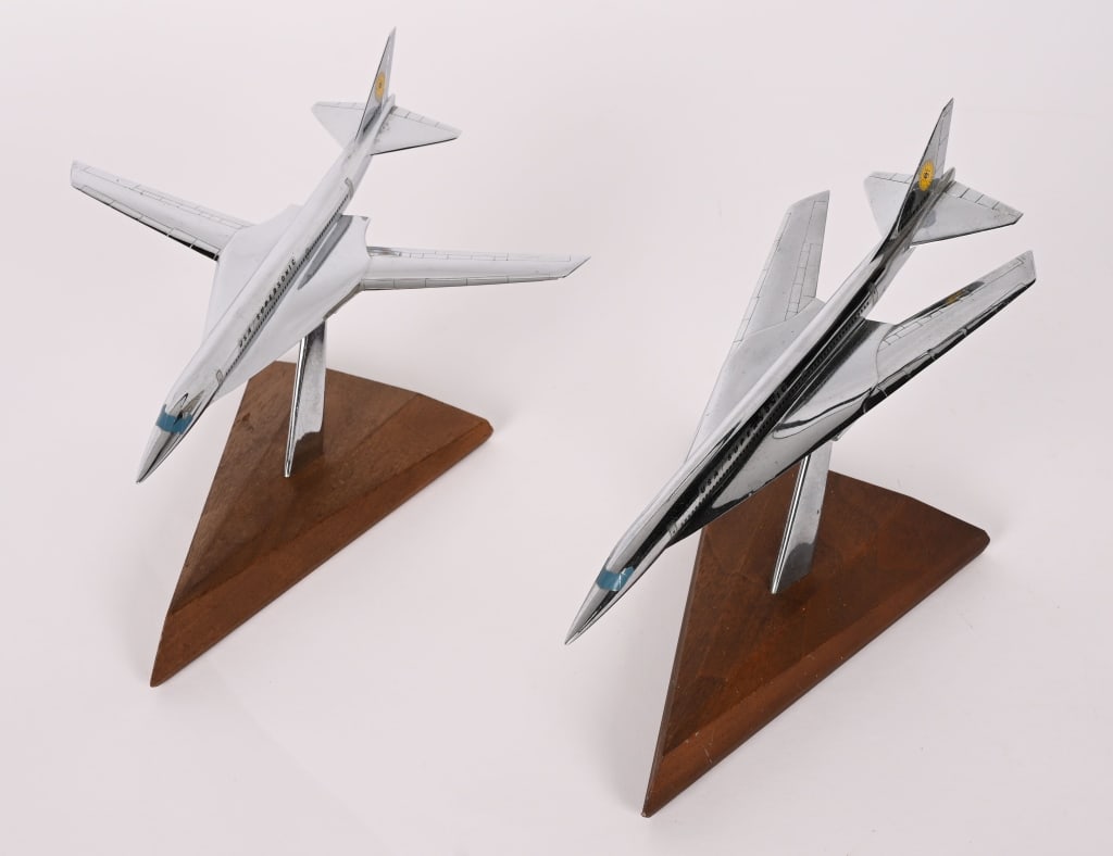 BOEING SST 733 AIRCRAFT MODEL LOT OF 2: Pair of SST Boeing 733 Aircraft made by Pacific Miniatures measuring roughly 9 inches long with one having the wings open and the other closed. Excellent. Boeing began small-scale SST studies in 1952.