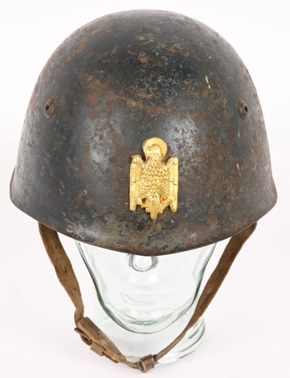 WWII SPANISH M26 ARMY HELMET WITH LINER WW2: A very nice Italian model 1933 helmet, worn during the Spanish Civil War (1936-1939), with a front frieze consisting of an eagle surmounted by the symbol of Spanish chivalry. These rare and particular