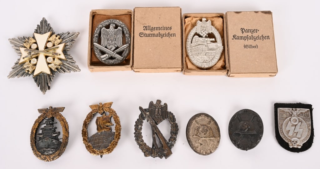 WWII NAZI GERMAN MEDAL LOT KRIEGSMARINE ARMY REPOP: Lot of WWII Nazi German Repop badges and insignia to include 1) GRAND CROSS OF THE GERMAN EAGLE ORDER. Marked to the reverse 900 21 2) SS Tinnie Marked Gruppe West 3) HIGH SEAS FLEET BADGE. Marked to 