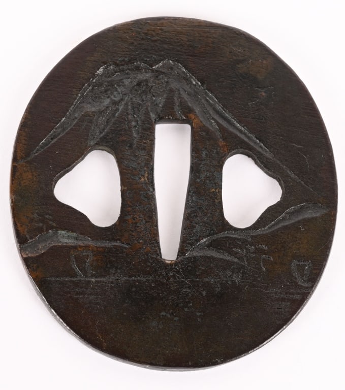 EARLY JAPANESE SWORD IRON TSUBA MOUNT FUJI: Japanese Edo Period Sword Tsuba measuring 2 13/16 inches in diameter and made of iron with Mount Fuji. Excellent.