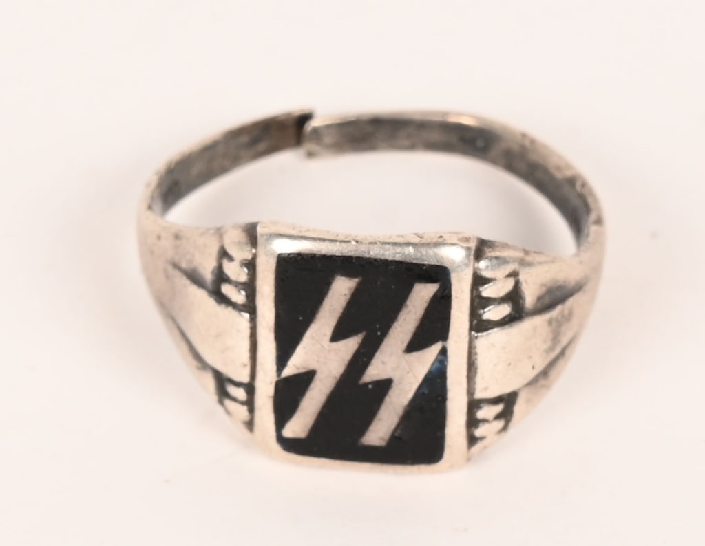 WWII WAFFEN SS RUNIC VETERAN BRING BACK RING WW2: The Schutzstaffel was a major paramilitary organisation under Adolf Hitler and the Nazi Party in Nazi Germany, and later throughout German-occupied Europe during World War II. It began with a small gu