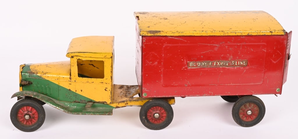 BUDDY L EXPRESS LINES SEMI TRUCK: Nice early Buddy L in original condition. All complete. Has electric headlights. Shows some play wear. Still displays nice. 22" Very Good Provenance: Tar Heel Toys the Dennis Sapp Collection