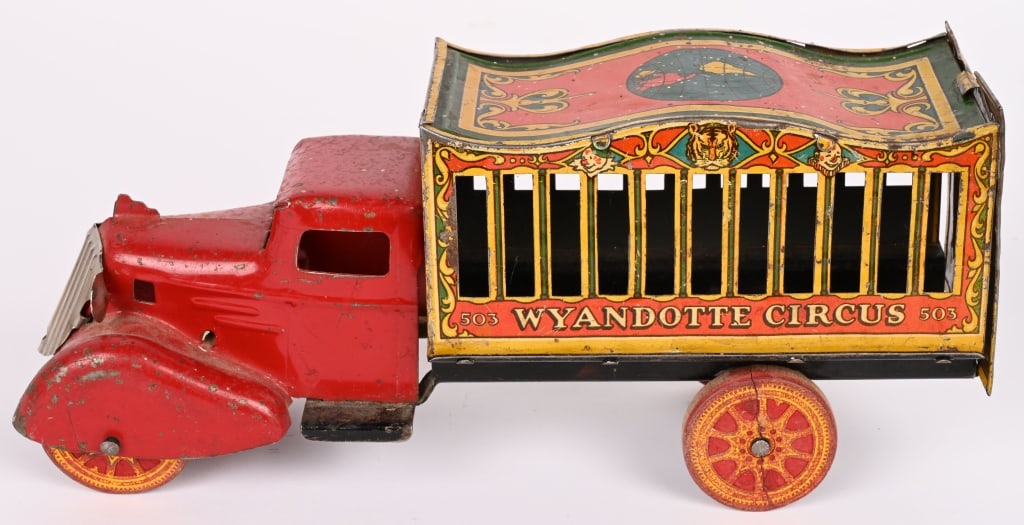 WYANDOTTE CIRCUS TRUCK: Nice original and still has rear gate. Has normal play wear. Grill replaced. 11" Very Good-Excellent Provenance: Tar Heel Toys the Dennis Sapp Collection