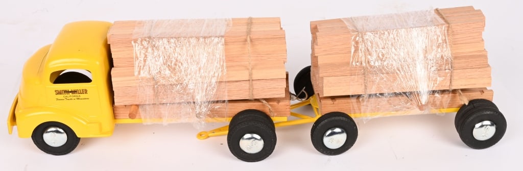 SMITH MILLER CUSTOM GMC LUMBER TRUCK & TRAILER: Great looking custom Smith Miller Truck. Nice GMC with Trailer. Very well done. Still has lumber load. 29" Excellent Provenance: Tar Heel Toys the Dennis Sapp Collection