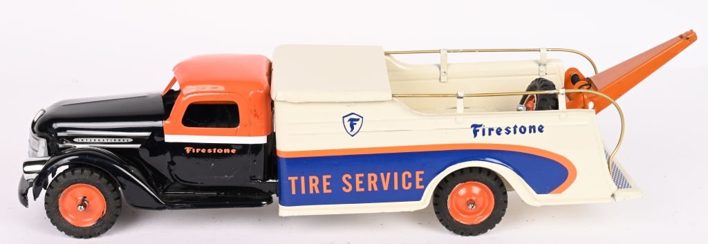 1953 BUDDY L FIRESTONE TIRE SERVICE WRECKER: Wonderful restored Buddy L. Very well done in factory colors. Very desirable toy. 25" Excellent Provenance: Tar Heel Toys the Dennis Sapp Collection