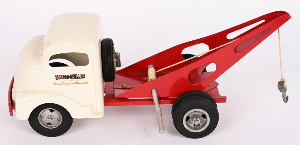 1952 SMITH MILLER GMC TOW TRUCK: Nice restoration. Desirable truck. 14" Excellent Provenance: Tar Heel Toys the Dennis Sapp Collection