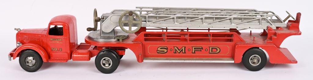 SMITH MILLER #5 LADDER FIRE TRUCK: All original condition. decent paint and decal. Gears stripped and bumper broke. Displays well. 35" Very Good-Excellent Provenance: Tar Heel Toys the Dennis Sapp Collection