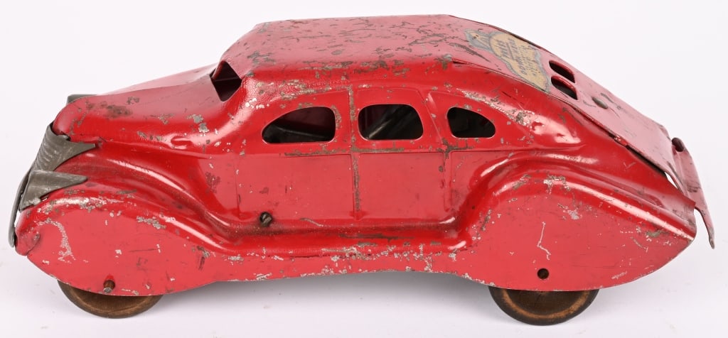 MARX WINDUP MYSTERY SEDAN: All original pressed steel car. has unique push down action. Works. 9" Very Good Provenance: Tar Heel Toys the Dennis Sapp Collection