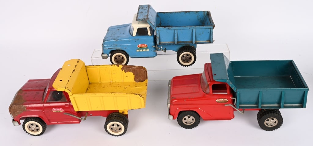 3- TONKA DUMP TRUCKS: Lot of 3 Tonka Dump Trucks. All in original condition. All perfect for restoration or enjoy as is. 13" AS-IS Provenance: Tar Heel Toys the Dennis Sapp Collection