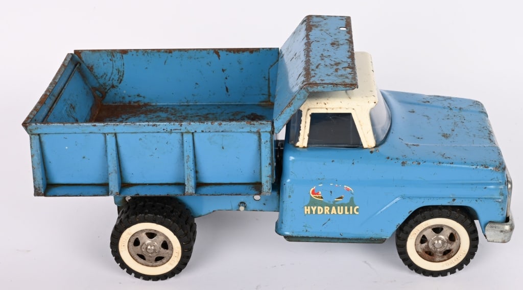 2- AMUMINUM CARS: Includes Faith Roadster all original condition and Ogelsby Futuristic Car restored condition. Largest 13" Excellent Provenance: Tar Heel Toys the Dennis Sapp Collection
