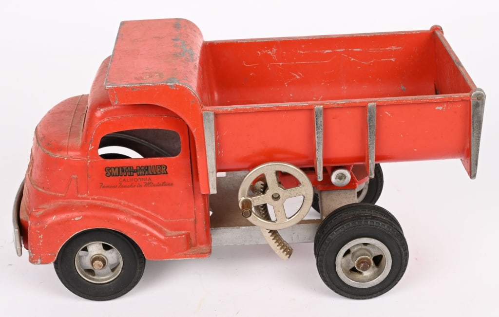 SMITH MILLER GMC DUMP TRUCK: All original with decent paint and decals. Should clean to higher grade. 11" Excellent Provenance: Tar Heel Toys the Dennis Sapp Collection