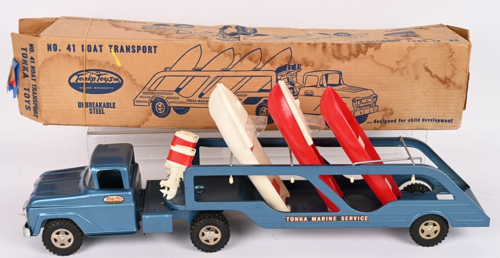 TONKA #41 BOAT TRANSPORT w/ BOX: all original condition with nice paint and decals. Comes with 3 Boats missing some parts. Boxed 27" Excellent