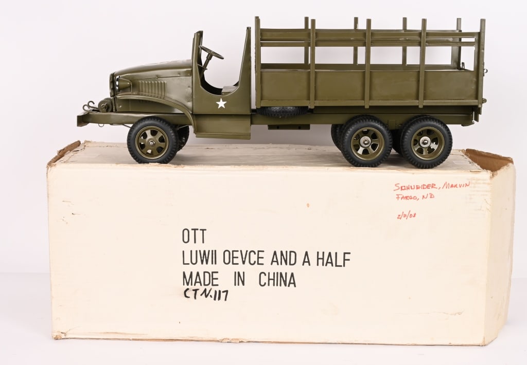 OLD TIME TOYS WWII DUECE & HALF MILITARY TRUCK: Very well made pressed steel truck. Never played with condition,. Still has accessories. Boxed 27" Near Mint