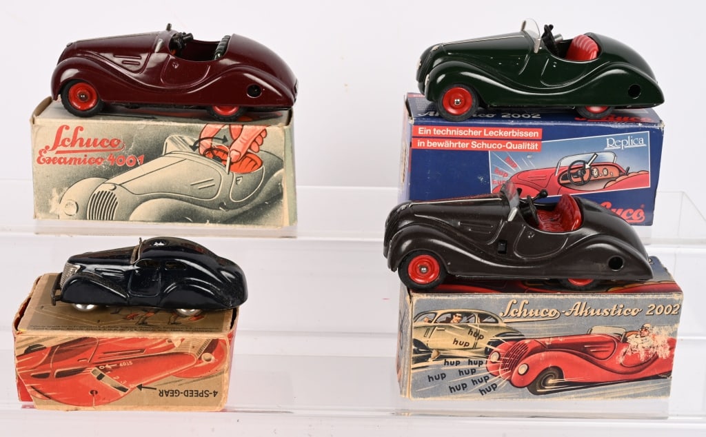 4- SCHUCO CARS w/ BOXES: Includes 2002, 4001, 3000, and Contemporary 2002. All in great shape with Boxes. 5 1/2" Excellent Provenance: Tar Heel Toys the Dennis Sapp Collection