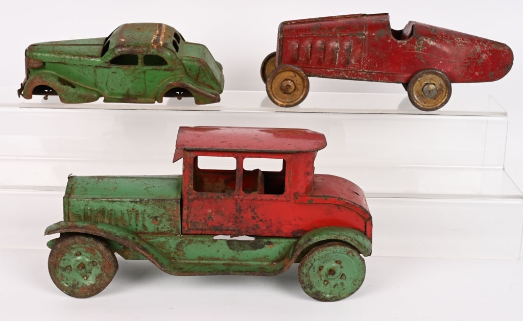 3- PRESSED STEEL VEHICLES: Includes Neff Moon car, Dayton Boat Tail racer, and Wyandotte Sedan. All in original various condition. Largest 12" AS-IS Provenance: Tar Heel Toys the Dennis Sapp Collection