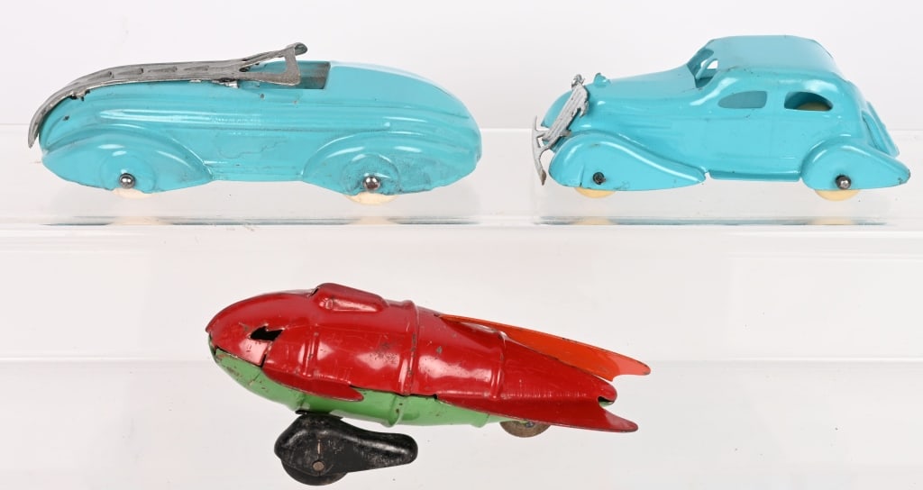 WYANDOTTE FLASH GORDON ROCKET & MORE: Includes all Original Rocket, Restored Futuristic Car,and Restored Sedan. All in nice condition. 7" Excellent Provenance: Tar Heel Toys the Dennis Sapp Collection