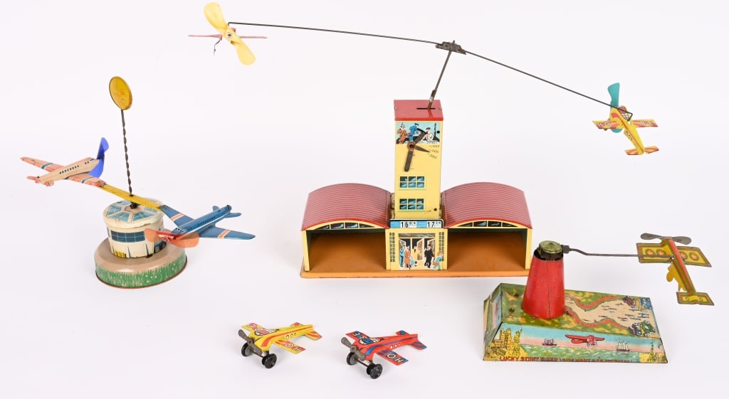 3- TIN WINDUP AIRPLANE GO-ROUNDS (1 of 10)