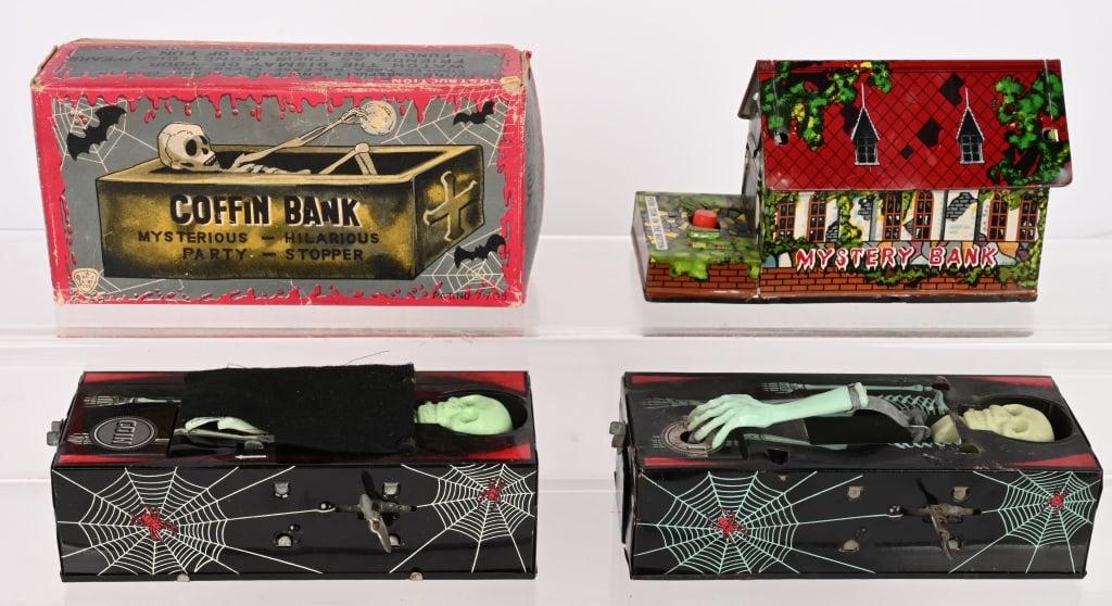 TIN WINDUP COFFIN & MYSTERY HAUNTED HOUSE BANKS: Includes 2 Coffin Banks one with Box and Mystery Haunted House Bank. All in great shape. 7" Excellent