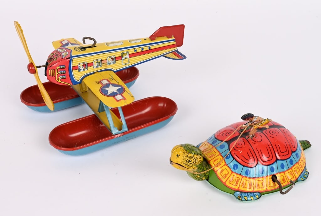 CHEIN WINDUP NATIVE ON TURTLE & SEA PLANE: Both original in nice condition and working. Largest 8" Excellent