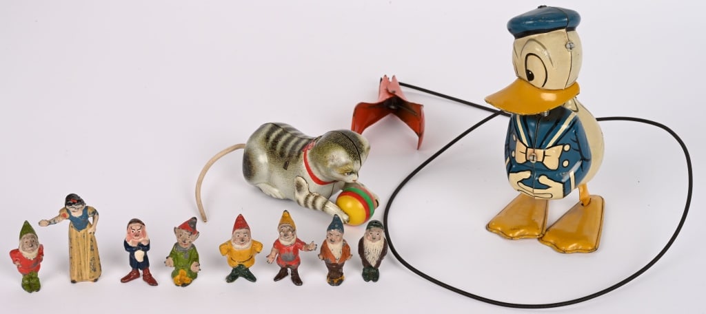 DONALD DUCK, SNOW WHITE, & MORE: Includes Linemar Hopping Donald Duck, Britain Snow White Set, and Rollover cat. all in great shape. Largest 6" Excellent