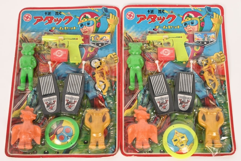 2- JAPAN SUPERHERO TARGET SETS MIB: Both target Sets includes Gun, Walkie Talkies, Vinyl Figures, Motorcycle, and More. Both sealed in package. 15" Excellent