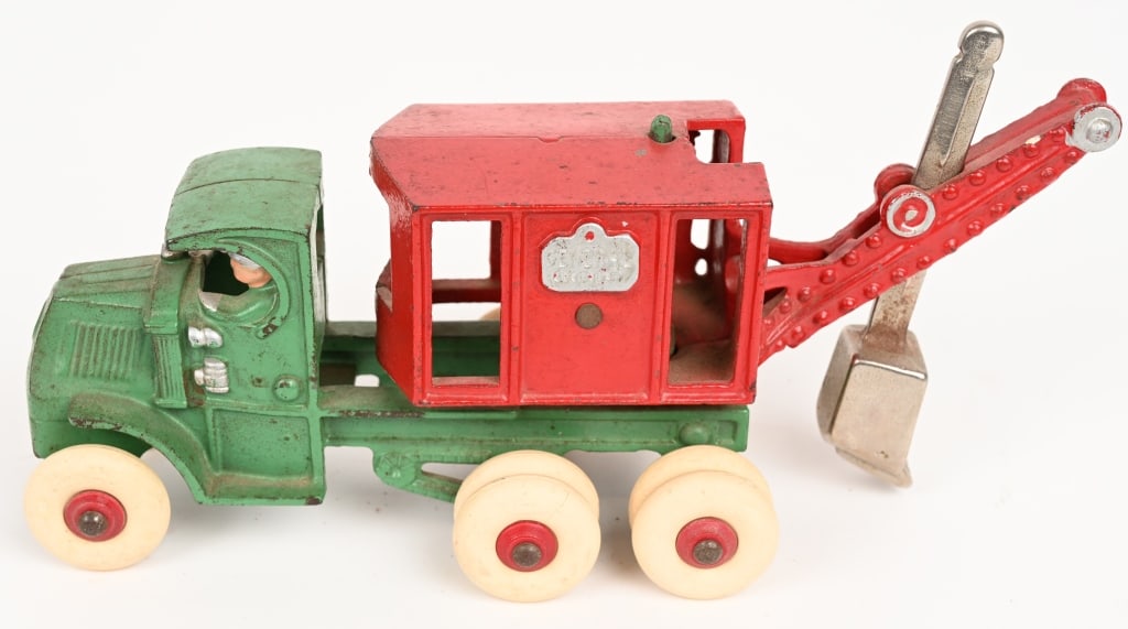 HUBLEY CAST IRON GENERAL DIGGER: Very clean original Hubley cast iron General Digger. All original including white rubber tires. Paint is in exceptional condition. No breaks or repairs. 10" Excellent