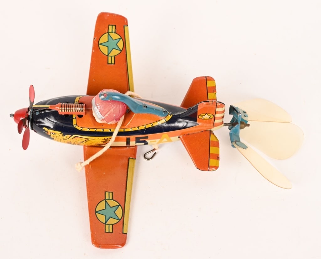 PRE-WAR JAPAN FIGHTER AIRPLANE: Wonderful Pre-War Japan tin and celluloid windup Fighter Plane. All original and in great condition. Made to fly on string. Windup works. Great looking airplane toy 7" Excellent