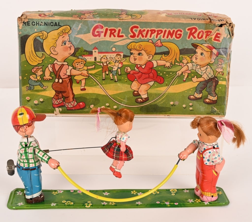 JAPAN TPS TIN WINDUP GIRL SKIPPING ROPE w/ BOX: All original toy that worked well when tested. The original box has wear. Excellent