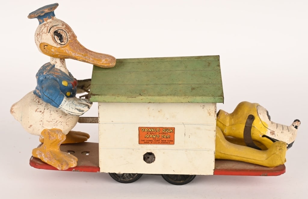 LIONEL DONALD DUCK HANDCAR: All original condition with some loss. Windup not working. 10 1/2" Very Good