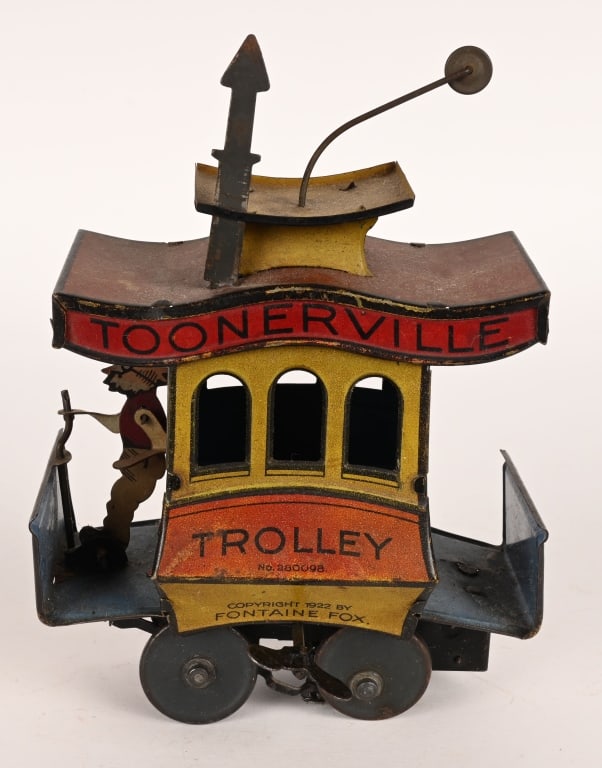 NIFTY TIN WINDUP TOONERVILLE TROLLEY: All original in decent condition. Windup still works. 6 1/2" excellent