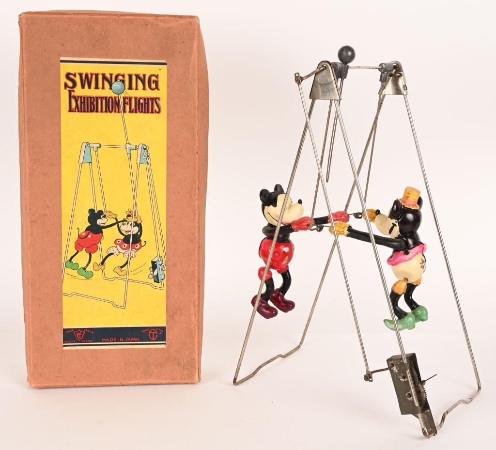 MICKEY & MINNIE MOUSE WINDUP ACROBATS w/ BOX: Mickey & Minnie Mouse celluloid windup Acrobats. Made in Japan. all original celluloid Mickey and Minnie figures swing on metal trapeze. All original and complete. Windup works. Comes with original