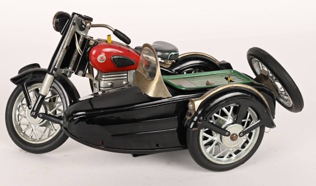 MARUSAN BATTERY OP SUNBEAM MOTORCYCLE: Japan battery operated Sunbeam Motorcycle. All original and complete. Toy has great details. Worked when tested. 9 1/2" Excellent
