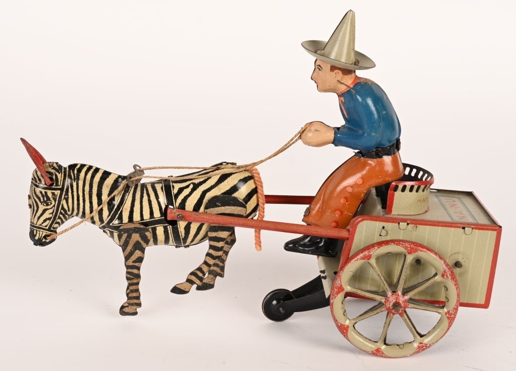 LEHMANN TIN WINDUP NA-NU ZEBRA CART: EPL 757, Lehmann tin windup NA-NU Zebra Cart. All original in great condition. Has very nice colors. Windup works. 7" Excellent