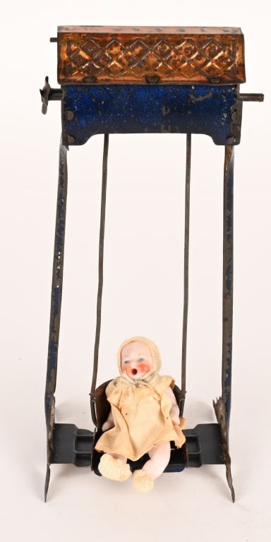 LEHMANN TIN WINDUP SWING DOLL: EPL 295, Lehmann tin windup Swing Doll. One of the earliest Lehmann toys produced. Swing is all original and working condition. comes with period bisque doll marked Germany. Possibly original to the