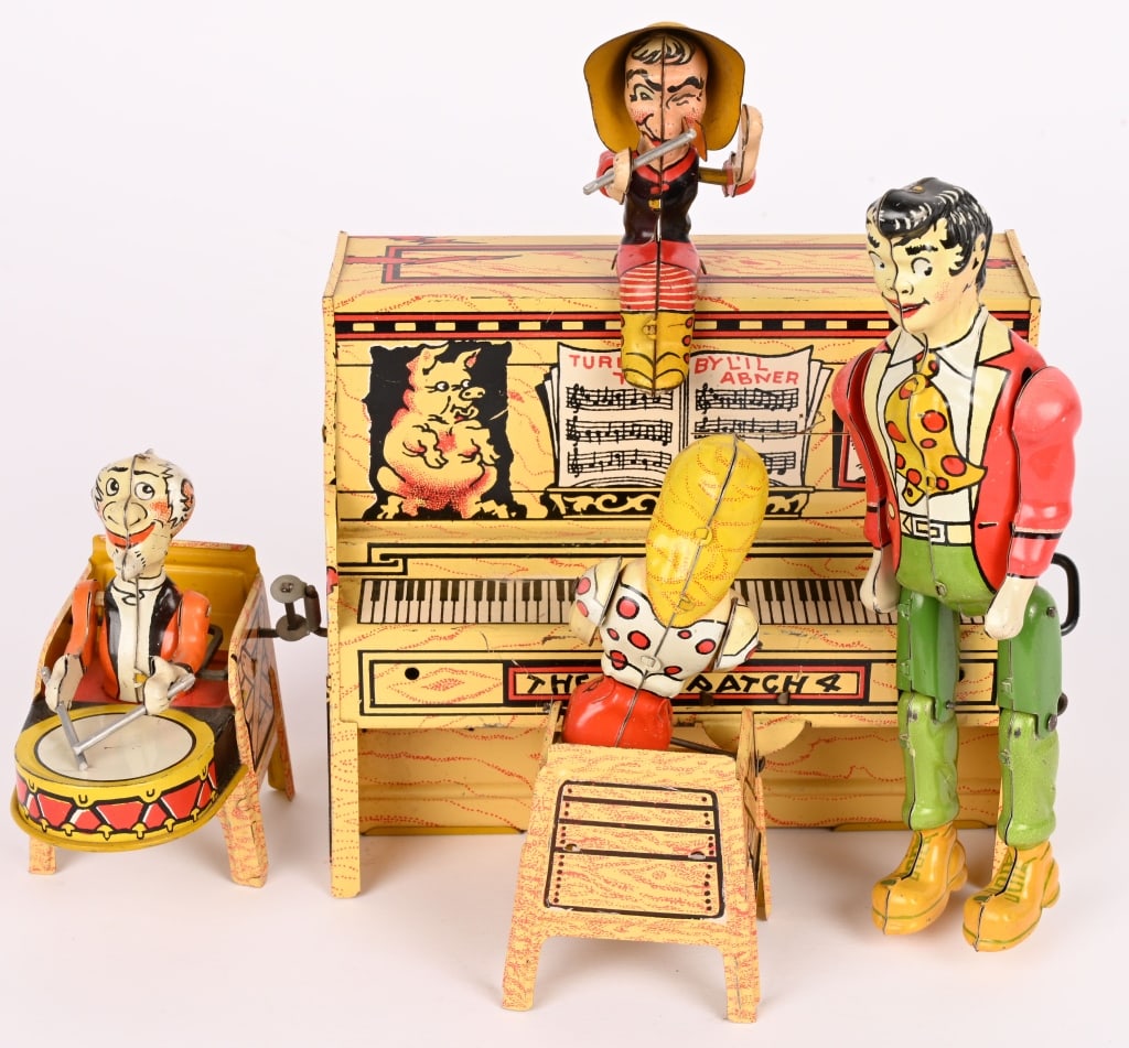 UNIQUE ART TIN WINDUP LIL ABNER BAND: All original and complete. Very nice condition. Windup works. 9" Excellent