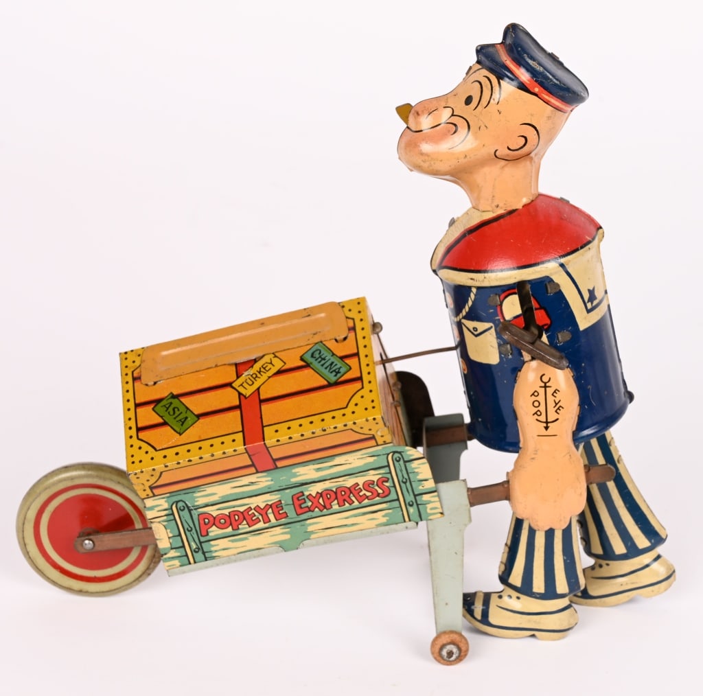 MARX TIN WINDUP POPEYE EXPRESS w/ MOVING PARROT: All original scarce version with moving parrot. Has nice colors. Windup working and parrot needs some adjustment. 8 1/2" Excellent