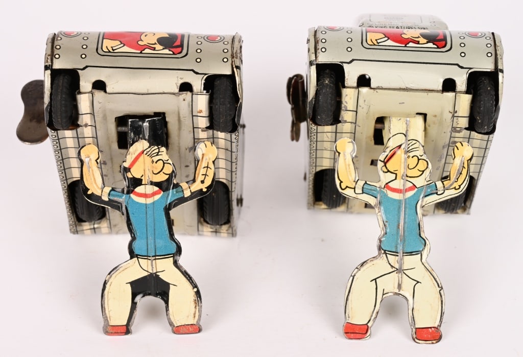 2-LINEMAR TIN WINDUP POPEYE TANKS: Both All original with nice graphics. Windups works. One of them has a dent on the bottom. 4" Very Good- Excellent