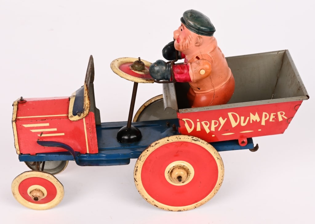 MARX TIN WINDUP BLUTO DIPPY DUMPER: Marx tin windup Bluto Dippy Dumper. All original and complete with Bluto celluloid figure. Toy has nice colors. Bluto figure has a couple dents. Windup still works. 9 1/2" Very Good