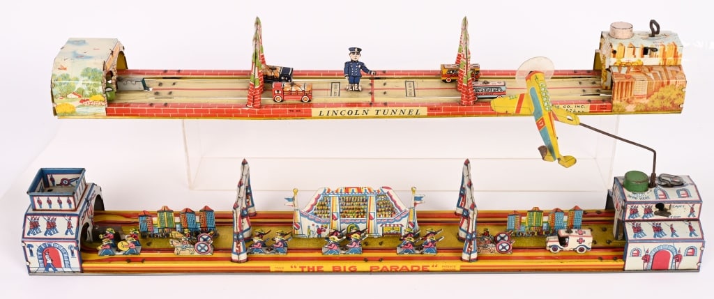 MARX "THE BIG PARADE & UNIQUE ART LINCOLN TUNNEL: The Marx The Big Parade windup works and has great color. Does not have correct plane. The Unique Art Mfg Lincoln Tunnel windup works. Overall Condition Excellent