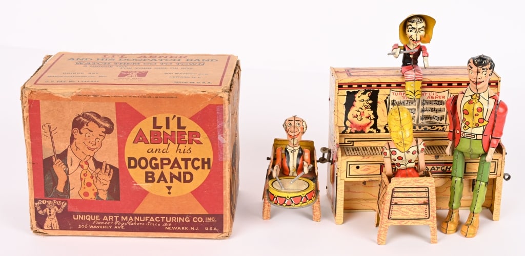 UNIQUE ART TIN WINDUP LIL ABNER BAND w/ BOX: Complete and original toy in working condition. Includes original box that has wear. Displays well 9" Excellent