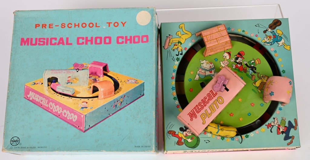 MARX TIN WINDUP MUSICAL PLUTO GO ROUND w/BOX: All original with nice colorful litho. Windup works. Comes with original box. 8" Excellent