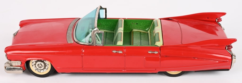 JAPAN TIN FRICTION 1959 CADILLAC CONVERTIBLE: All original nice looking car. Friction works. 11" Excellent