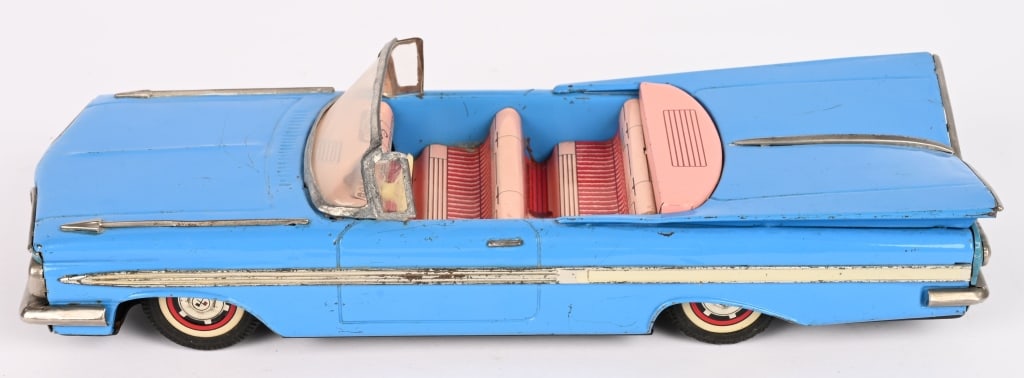 JAPAN TIN FRICTION 1959 IMPALA CONVERTIBLE: All original in nice condition. Friction works. 11 1/2" Excellent