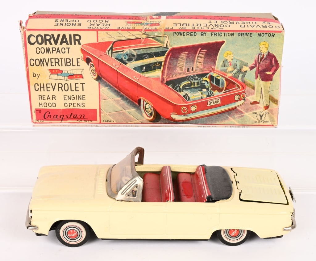 JAPAN TIN FRICTION CORVAIR & OPENING HOOD w/ BOX: All original with opening hood showing engine. Looks never played with condition. Friction works. Boxed 9" Excellent