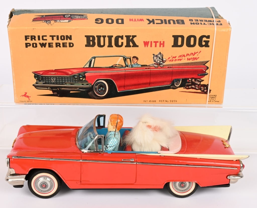 JAPAN TIN FRICTION BUICK WITH DOG w/ BOX: Great looking Buick Convertible with Dog. All original in great shape. Friction works and dog barks. Boxed 11" Excellent