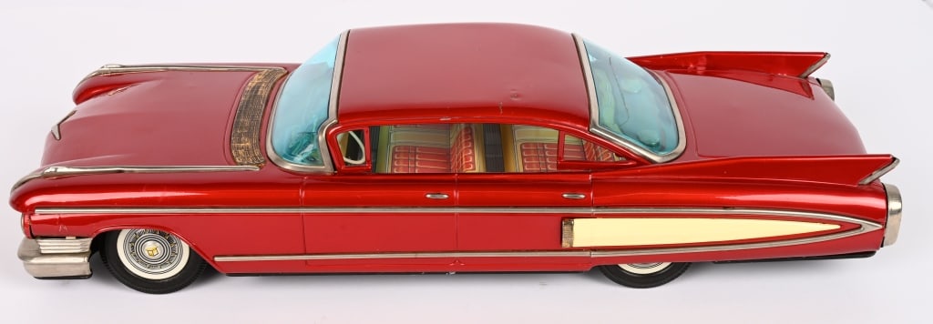 YONEZAWA TIN FRICTION 1960 CADILLAC CONVERTIBLE: Very large impressive tin Cadillac. All original with nice details. Great looking car. Friction works. 18" Excellent